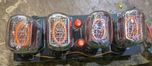 A Nixie clock PCB displaying the time
